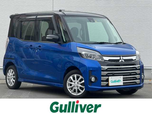 三菱 ｅＫスペース カスタムT セーフティプラスED 秋田県 2018(平30)年 4.2万km ライトニングブルーマイカ 4WD/ターボ/純正メモリナビ/　【フルセグ/CD/DVD/USB/SD/BT/MSV】/バックカメラ・全周囲カメラ/純正エンジンスターター/装着：社外AWスタッドレスタイヤ 155/65/R14/車載：純正AWサマータイヤ 　　　165/55/R15/ステアリングスイッチ/クルーズコントロール/運転席シートヒーター/両側パワースライドドア/LEDヘッドライト（AUTO機能付き）・フォグランプ/オートマチックハイビーム/アイドリングストップ/衝突軽減システム/横滑り防止機能/レーンキープアシスト/パーキングアシスト/コーナーセンサー/リアサーキュレーター/リアサンシェード/純正フロアマット/純正ドアバイザー