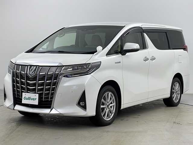 トヨタ アルファードハイブリット X 大分県 2019(令1)年 7.8万km ホワイトパールクリスタルシャイン ・4WD/・寒冷地仕様/・純正ナビ＆CD＆DVD&SD&BT&HDMI&TV&USB/・両側パワースライドドア/・純正デジタルインナーミラー/・レーダークルーズコントロール/・パーキングサポートブレーキ/・レーントレーシングアシスト/・プリクラッシュセーフティ/・クリアランスソナー/・ブラインドスポットモニター/・ロードサインアシスト/・純正フリップダウンモニター/・AC100V1500W/・ステアリングスイッチ/・革調シートカバー/・TVキャンセラー/・社外フロントカメラ/・バックカメラ/・後席カーテン/・純正ドライブレコーダー/・プッシュスタート/・スマートキー/・スペアキー/・ドアミラーヒーター/・社外１７インチAW/・LEDフォグ