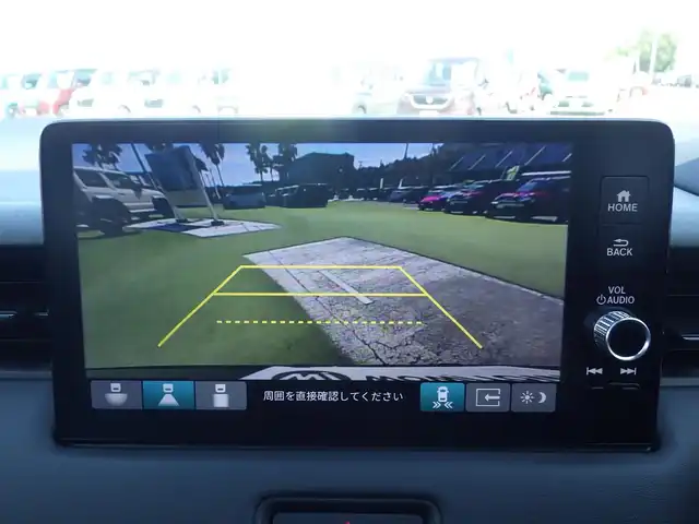 ホンダ ヴェゼル ハイブリッド e:HEV Z 千葉県 2025(令7)年 0.1万km未満 クリスタルブラックパール e:HEV Z　3VC4AZ　Honda CONNECTディスプレー+ETC2.0車載器+ワイヤレス充電器(220/000)　フロントグリル　ベルリナブラック(41250円)/ホンダセンシング/・衝突軽減ブレーキ（CMBS）/・車線維持支援システム（LKAS）/・アダプティブクルーズコントロール（ACC）/・後方誤発進抑制機能/・誤発進抑制機能/パワーバックドア/ホンダコネクトナビ/地デジTV/【Bluetooth接続】/【Apple CarPlay　Android Auto対応】/バックカメラ/ワイヤレス充電/革巻きステアリング/ステアリングヒーター/ステアリングスイッチ/パドルシフト/前席シートヒーター/ETC（2.0）/LEDヘッドライト/フォグライト/ウインカーミラー/純正18インチアルミホイル/サイド/カーテンエアバッグ/Honda スマートキー