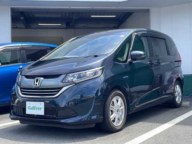 ホンダ フリード ハイブリット G ホンダセンシング 京都府 2018(平30)年 3.2万km フォレストグリーンパール 純正メモリナビ　Ｂｌｕｅｔｏｏｔｈオーディオ　フルセグ　ＤＶＤ再生　バックカメラ　両側パワースライドドア　アダプティブクルーズコントロール　レーンキープアシスト　ＬＥＤヘッドライト　前後ドラレコ