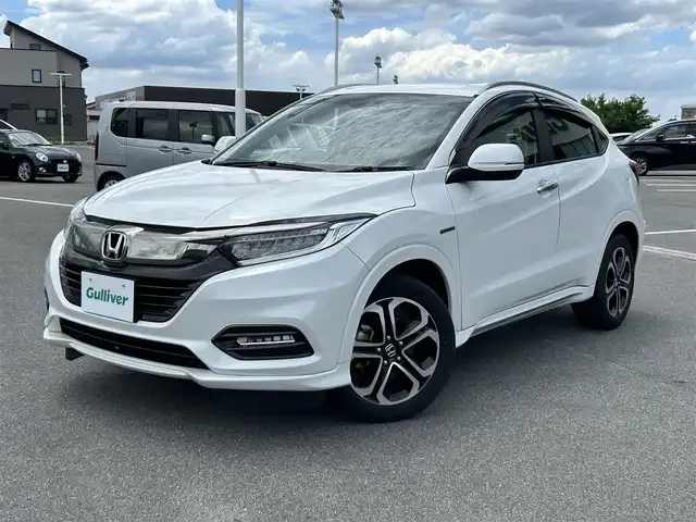 ホンダ ヴェゼル ハイブリッド Z ホンダセンシング 奈良県 2018(平30)年 5.3万km プラチナホワイトパール 純正ナビ(ワンセグTV/CD/DVD/AM・FM/BT/AUX/iPod/USB)/バックカメラ/ビルトインETC/前後ドラレコ/HondaSENSING/クルーズコントロール/パドルシフト/オートブレーキホールド/シートヒーター(D/N席)/ハーフレザーシート/LEDヘッドライト/純正17インチアルミホイール/純正フロアマット