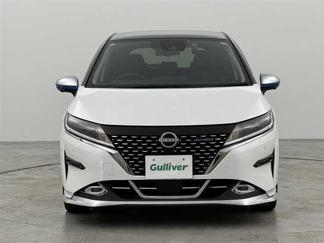 日産 ノート オーテック 福岡県 2021(令3)年 2.6万km ピュアホワイトパール / スーパーブラック 2トーン 純正９型ナビ　/フルセグTV/アラウンドビューモニター　/ＥＴＣ　/前方ドライブレコーダー　/インテリジェントルームミラー　/置くだけ充電　/プロパイロット　/コーナーセンサー　/エマージェンシーブレーキ　/レーンキープ　/ＢＳＭ　/シートヒーター　/ハーフレザーシート　/ステアリングヒーター　/純正16インチアルミホイール