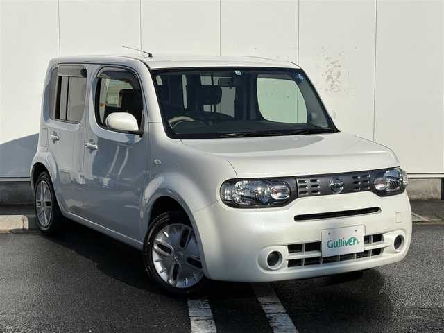 日産 キューブ 15X ロルブーセレクション 三重県 2013(平25)年 4万km ブリリアントホワイトパール 純正ナビ（CD/TV/SD/AM/FM/AUX）/バックカメラ/プッシュスタート/純正フロアマット/純正ドアバイザー/アイドリングストップ/電動格納ミラー/バニティミラー/ヘッドライトレベライザー/チェック柄ブルースエード調クロスシート/革巻きステアリングホイール/メッキインサイドドアハンドル/スペアタイヤ/インテリジェントキー/プッシュスタート/スペアキー