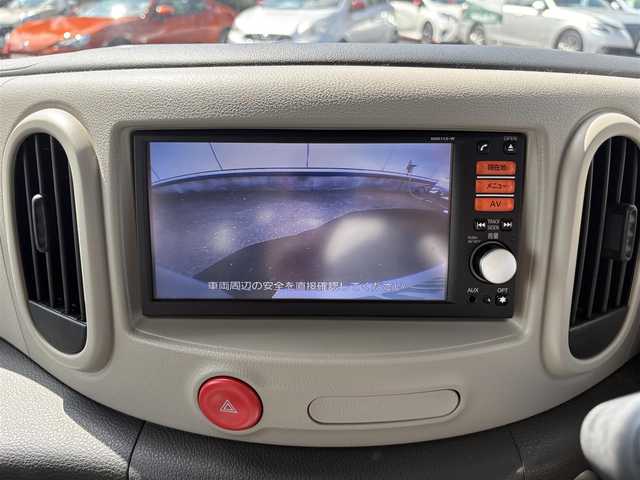 日産 キューブ 15X ロルブーセレクション 三重県 2013(平25)年 4万km ブリリアントホワイトパール 純正ナビ（CD/TV/SD/AM/FM/AUX）/バックカメラ/プッシュスタート/純正フロアマット/純正ドアバイザー/アイドリングストップ/電動格納ミラー/バニティミラー/ヘッドライトレベライザー/チェック柄ブルースエード調クロスシート/革巻きステアリングホイール/メッキインサイドドアハンドル/スペアタイヤ/インテリジェントキー/プッシュスタート/スペアキー