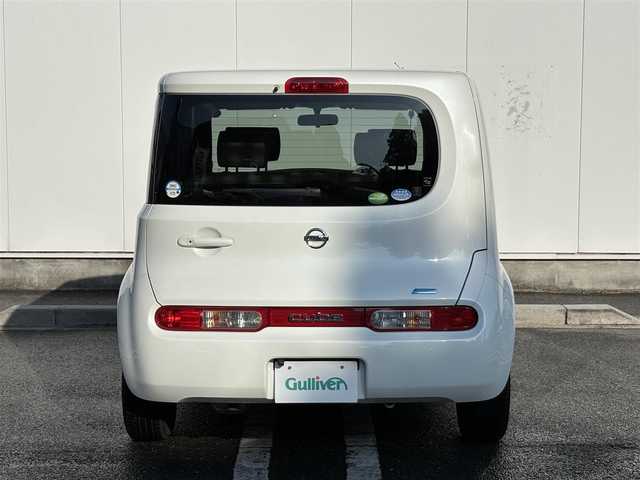 日産 キューブ 15X ロルブーセレクション 三重県 2013(平25)年 4万km ブリリアントホワイトパール 純正ナビ（CD/TV/SD/AM/FM/AUX）/バックカメラ/プッシュスタート/純正フロアマット/純正ドアバイザー/アイドリングストップ/電動格納ミラー/バニティミラー/ヘッドライトレベライザー/チェック柄ブルースエード調クロスシート/革巻きステアリングホイール/メッキインサイドドアハンドル/スペアタイヤ/インテリジェントキー/プッシュスタート/スペアキー