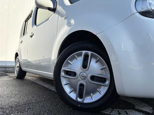 日産 キューブ 15X ロルブーセレクション 三重県 2013(平25)年 4万km ブリリアントホワイトパール 純正ナビ（CD/TV/SD/AM/FM/AUX）/バックカメラ/プッシュスタート/純正フロアマット/純正ドアバイザー/アイドリングストップ/電動格納ミラー/バニティミラー/ヘッドライトレベライザー/チェック柄ブルースエード調クロスシート/革巻きステアリングホイール/メッキインサイドドアハンドル/スペアタイヤ/インテリジェントキー/プッシュスタート/スペアキー