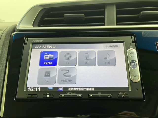 ホンダ フィット ハイブリット Lパッケージ 栃木県 2015(平27)年 5.6万km アラバスターシルバーメタリック 純正SDナビ（VXM-155C）/　CD/USB/AUX/FM/AM/あんしんパッケージ/シティブレーキアクティブシステム/横滑り防止装置/黒革ハーフシート/クルーズコントロール/バックカメラ/スーパーUVカットフロントドアガラス/IRカットガラス/LEDヘッドライト/プラズマクラスター/ETC