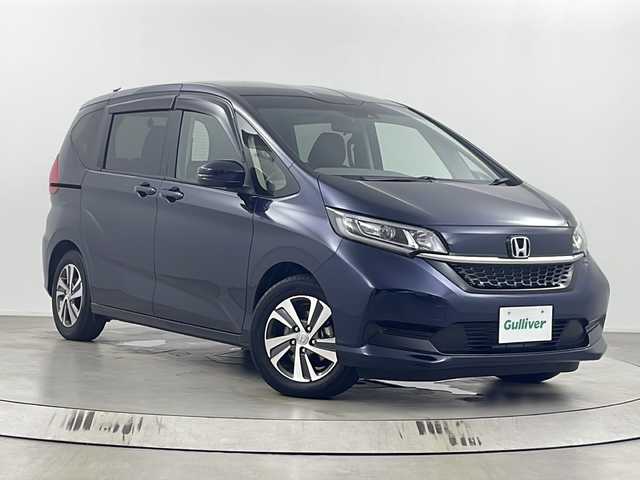 ホンダ フリード G ホンダセンシング 埼玉県 2020(令2)年 1万km ミッドナイトブルービームM 純正ナビ（VXM-215Ci）/バックカメラ/前後ドライブレコーダー/ビルトインETC/両側パワースライドドア/アダプティブクルーズコントロール/前席シートヒーター/先行車発進お知らせ機能/横滑り防止装置/プリクラッシュセーフティ/ステアリングリモコン/レーンキープアシスト/盗難防止装置/衝突軽減ブレーキ/プッシュスタート/アイドリングストップ/ロールサンシェード/純正フロアマット/純正ドアバイザー/LEDヘッドライト/ウィンカーミラー/純正アルミホイール