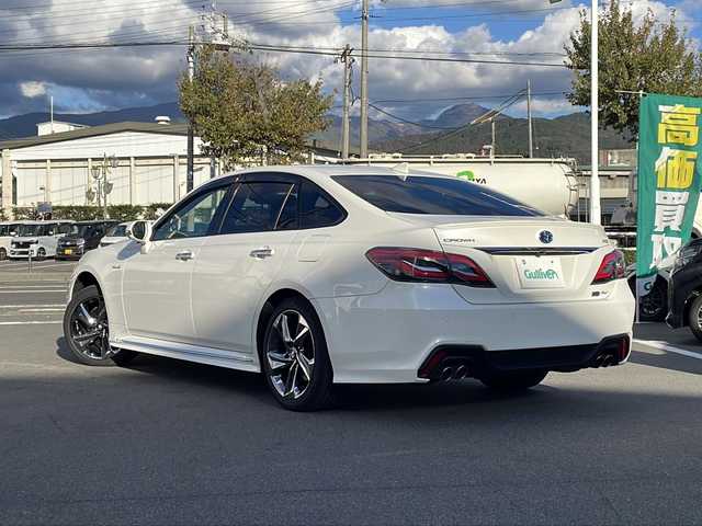 トヨタ クラウン ハイブリッド RS Four 長野県 2018(平30)年 5.8万km ホワイトパールクリスタルシャイン 禁煙車/純正ナビ（CD/DVD/フルセグTV/Bleutooth）/純正18インチAW/スタッドレス積み込み/セーフティセンス/・プリクラッシュセーフティ/・レーントレーシングアシスト/・レーダークルーズコントロール/・オートマチックハイビーム/・ロードサインアシスト/・先行車発進告知機能/バックカメラ/サンルーフ/ビルトインETC2.0/ドライブレコーダー（F・R）/前席パワーシート/前席シートヒーター/ステアリングヒーター/革巻きステアリング/ステアリングスイッチ/パドルシフト/電動パーキングブレーキ/ブレーキホールド/３眼LEDヘッドライト/シーケンシャルターンランプ/フォグランプ/オートライト/スマートキー/Pスタート/電動格納ミラー/純正フロアマット