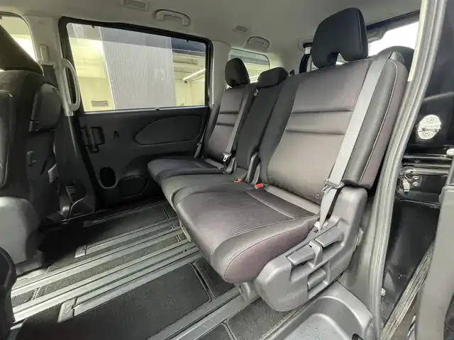 日産 セレナ ハイウェイスター プロパイロットED 滋賀県 2016(平28)年 6.9万km ダイヤモンドブラック 純正9インチナビ/【Bluetooth/CD/DVD/Blu-ray/HDMI/フルセグTV】/純正フリップダウンモニター/両側パワースライドドア/プロパイロット/ビルトインETC/衝突軽減ブレーキ/クリアランスソナー/オートライト/プッシュスタート/スマートキー