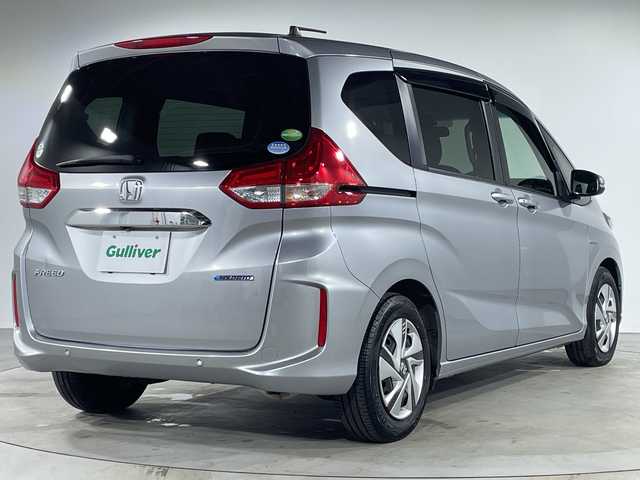 ホンダ フリード ハイブリット G ホンダセンシング 福岡県 2020(令2)年 5.7万km ルナシルバーM 禁煙車/純正メモリナビ/・AM/FM/CD/BT/・バックモニター/ホンダセンシング/コーナーセンサー/両側パワースライドドア/ETC/ステアリングリモコン/LEDヘッドライト/・オートライト/スマートキー/・プッシュスタート/純正フロアマット/純正ドアバイザー