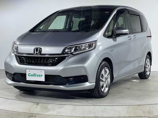 ホンダ フリード ハイブリット G ホンダセンシング 福岡県 2020(令2)年 5.7万km ルナシルバーM 禁煙車/純正メモリナビ/・AM/FM/CD/BT/・バックモニター/ホンダセンシング/コーナーセンサー/両側パワースライドドア/ETC/ステアリングリモコン/LEDヘッドライト/・オートライト/スマートキー/・プッシュスタート/純正フロアマット/純正ドアバイザー