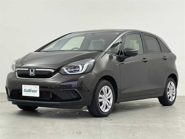 ホンダ フィット e:HEVホーム 千葉県 2021(令3)年 3.7万km プレミアムグラマラスブロンズP Honda SENSING/・衝突軽減ブレーキ/・誤発進抑制制御/・先行車発進告知機能/・標識認識機能/・路外逸脱制御/・ACC アダプティブクルーズコントロール/・LKAS レーンキープアシスト/純正9インチメモリーナビ/・フルセグTV/・DVD再生可能/・Bluetoothオーディオ接続/・バックカメラ/ハーフレザーシート/スマートキー/プッシュスタート/前後コーナーセンサー/LEDヘッドライト/純正ラバーマット/ETC