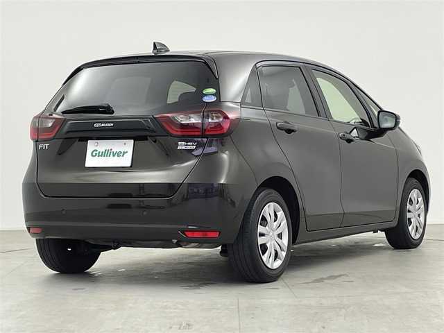 ホンダ フィット e:HEVホーム 千葉県 2021(令3)年 3.7万km プレミアムグラマラスブロンズP Honda SENSING/・衝突軽減ブレーキ/・誤発進抑制制御/・先行車発進告知機能/・標識認識機能/・路外逸脱制御/・ACC アダプティブクルーズコントロール/・LKAS レーンキープアシスト/純正9インチメモリーナビ/・フルセグTV/・DVD再生可能/・Bluetoothオーディオ接続/・バックカメラ/ハーフレザーシート/スマートキー/プッシュスタート/前後コーナーセンサー/LEDヘッドライト/純正ラバーマット/ETC