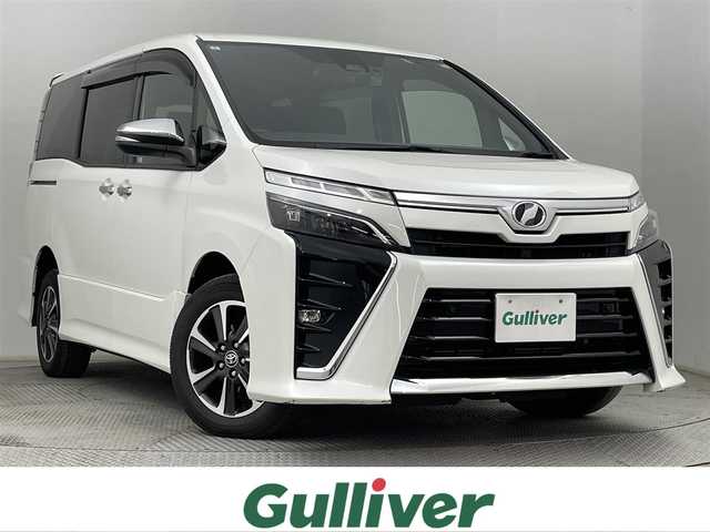 トヨタ ヴォクシー ZS 煌Ⅱ 道央・札幌 2020(令2)年 3.5万km ホワイトパールクリスタルシャイン ・4WD/・寒冷地仕様/・ワンオーナー/・純正ナビ/・フルセグ/BT/CD/DVD/SD/・バックカメラ/・トヨタセーフティセンス/・レーンキープアシスト/・クリアランスソナー/・クルーズコントロール/・ETC/・両側パワースライド/・アイドリングストップ/・横滑り防止装置/・オートライト/・スマートキー/・プッシュスタート/・LEDヘッドライト/・フォグランプ/・積込社外AW＋冬タイヤ/・保証書/・取扱説明書