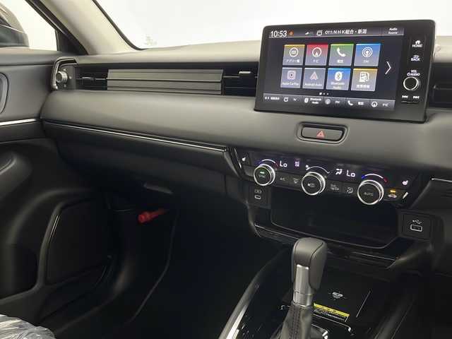 ホンダ ヴェゼル ハイブリッド e:HEV Z 新潟県 2025(令7)年 0.1万km未満 クリスタルブラックパール 純正メモリナビ（Bluetooth・USB）/バックカメラ　/フルセグ　/ハーフレザーシート　/前席シートヒーター　/電動リアゲート/４WD/純正フロントグリル積載（ベルリナブラック×クロームメッキ）/パーキングアシスト/ホンダセンシング　/レーンキープアシスト　/ヒルディセントコントロール　/前後コーナーセンサー/純正ＥＴＣ２．０　/ホンダコネクト　/ＬＥＤオートライト/オートマチックハイビーム/フロントワイパーデアイサー/ステアリングヒーター/ワイヤレス充電器/純正１８インチアルミホイール/保証書/取扱説明書/スマートキー/スペアキー