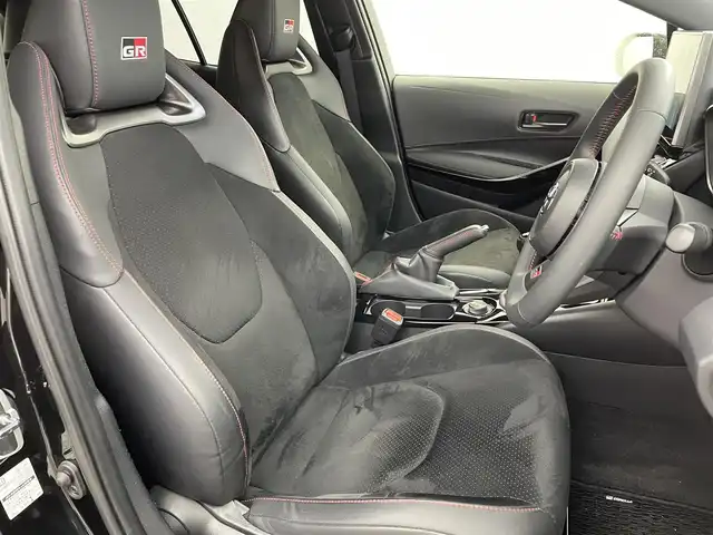 トヨタ ＧＲカローラ RZ 愛知県 2023(令5)年 1.8万km プレシャスブラックパール 6速MT/4WD/GR専用装備/　　・専用セミバケットフロントシート/　　・専用レッドシートベルト/　　・3本出しマフラー/　　・GRキャリパー/　　・純正メタルスターチタンブラック塗装18インチアルミホイール/　　・フロアマット/純正8インチコネクテッドナビ対応ディスプレイオーディオPlus/JBLプレミアムサウンド/フルセグTV/HUD/ビルトインETC/トヨタセーフティセンス　/　　・プリクラッシュセーフティ/　　・レーンディバーチャーアラート/　　・レーダークルーズコントロール/　　・ロードサインアシスト/　　・オートマチックハイビーム/ブラインドスポットモニター/スマートキー