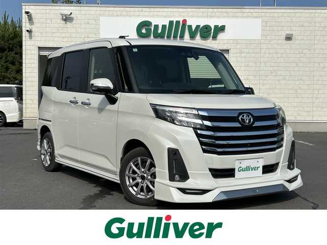 トヨタ ルーミー カスタムG－T 島根県 2022(令4)年 4.5万km パールホワイトⅢ 純正９インチSDナビ　/全方位/バックカメラ　/フルセグTV・ＤＶＤ再生・Ｂｌｕｅｔｏｏｔｈ　/モデリスタフルエアロ　/両側パワースライドドア/前後ドラレコ　/ビルトインＥＴＣ　/前席シートヒーター　/電子パーキングブレーキ/（オートホールド機能付）/レーダークルーズコントロール/衝突軽減ブレーキ/レーンアシスト/アイドリングストップ/純正フロアマット