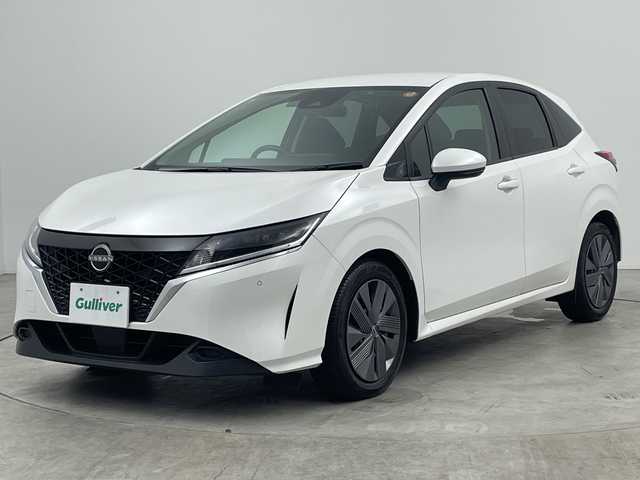 日産 ノート X 三重県 2023(令5)年 2.6万km ピュアホワイトパール 禁煙車/社外ナビ/・AM/FM/CD/DVD/iPod/Bluetooth/エマージェンシーブレーキ/バックカメラ/オートハイビーム/オートライト/ドライブレコーダー/ETC/電動パーキング/プッシュスタート/スマートキー/スペアキー/LEDヘッドライト/360°セーフティ/駐車支援/速度標識表示/標識検知支援