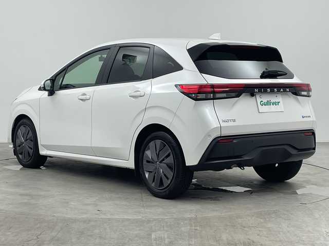 日産 ノート X 三重県 2023(令5)年 2.6万km ピュアホワイトパール 禁煙車/社外ナビ/・AM/FM/CD/DVD/iPod/Bluetooth/エマージェンシーブレーキ/バックカメラ/オートハイビーム/オートライト/ドライブレコーダー/ETC/電動パーキング/プッシュスタート/スマートキー/スペアキー/LEDヘッドライト/360°セーフティ/駐車支援/速度標識表示/標識検知支援