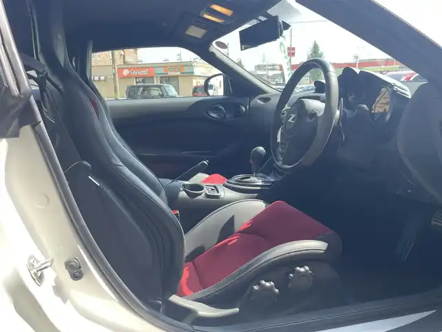 日産 フェアレディ Ｚ ニスモ 愛知県 2019(令1)年 6.5万km ブリリアントホワイトパール AIS検査実施済　評価点4.5点　/ワンオーナー　/メーカーＨＤＤナビ　/バックカメラ　/ハーフレザー　/パドルシフト　/ＨＩＤヘッド　/ＢＯＳＥプレミアムサウンド　/オートライト　/インテリジェントキー　/ドライブレコーダー　/スペアキー　/保証書　/説明書