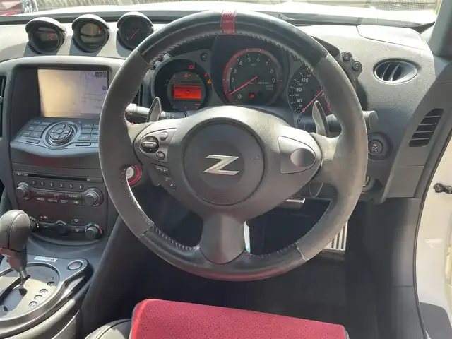 日産 フェアレディ Ｚ ニスモ 愛知県 2019(令1)年 6.5万km ブリリアントホワイトパール AIS検査実施済　評価点4.5点　/ワンオーナー　/メーカーＨＤＤナビ　/バックカメラ　/ハーフレザー　/パドルシフト　/ＨＩＤヘッド　/ＢＯＳＥプレミアムサウンド　/オートライト　/インテリジェントキー　/ドライブレコーダー　/スペアキー　/保証書　/説明書
