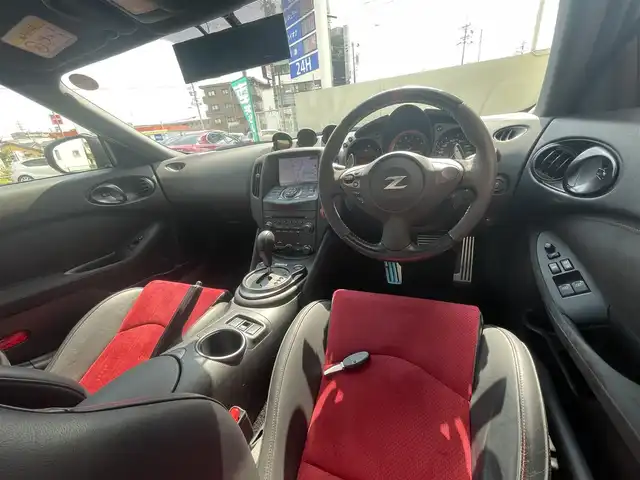 日産 フェアレディ Ｚ ニスモ 愛知県 2019(令1)年 6.5万km ブリリアントホワイトパール AIS検査実施済　評価点4.5点　/ワンオーナー　/メーカーＨＤＤナビ　/バックカメラ　/ハーフレザー　/パドルシフト　/ＨＩＤヘッド　/ＢＯＳＥプレミアムサウンド　/オートライト　/インテリジェントキー　/ドライブレコーダー　/スペアキー　/保証書　/説明書