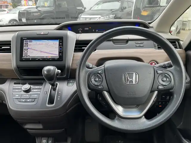 ホンダ フリード G ホンダセンシング 石川県 2020(令2)年 5.9万km プラチナホワイトパール 純正メモリーナビ/フルセグTV/バックカメラ/LEDヘッドライト/ETC/ドライブレコーダー/両側パワースライドドア/スマートキー/プッシュスタート/電動ミラー/レーダークルーズ/クリアランスソナー/ホンダセンシング/保証書