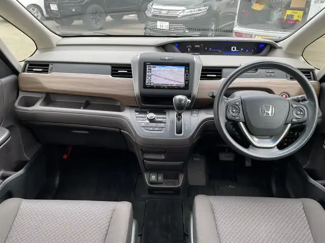 ホンダ フリード G ホンダセンシング 石川県 2020(令2)年 5.9万km プラチナホワイトパール 純正メモリーナビ/フルセグTV/バックカメラ/LEDヘッドライト/ETC/ドライブレコーダー/両側パワースライドドア/スマートキー/プッシュスタート/電動ミラー/レーダークルーズ/クリアランスソナー/ホンダセンシング/保証書