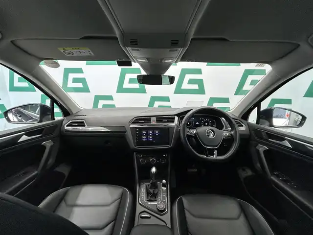 フォルクスワーゲン ティグアン TDI 4モーション ハイライン 鹿児島県 2019(令1)年 3.2万km アトランティックブルーメタリック 禁煙車/純正ナビ/　・Bluetooth/　・CD/DVD/　・AppleCarplay/　・AndroidAuto/　・SDカード/　・フルセグTV/全周囲カメラ/ブラインドスポットモニター/ヘッドアップディスプレイ/電動パーキングブレーキ/オートブレーキホールド/3ゾーンフルオートエアーコンディショナー/(運転席/助手席/後席独立調整、自動内気循環機能付)/運転席メモリーシート/全席シートヒーター/ビルトインETC2.0/電動リアゲート/電動格納ミラー/純正アルミホイール/LEDヘッドライト/フォグランプ/ワンオーナー