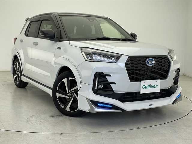 ダイハツ ロッキー プレミアム G HEV 千葉県 2022(令4)年 2.3万km ブラックマイカメタリック/シャイニングホワイトパール モデリスタエアロ/衝突軽減ブレーキ/レーンキープアシスト/レーダークルーズコントロール/オートマチックハイビーム/純正メモリナビ/（フルセグ/Bluetooth/CD/DVD/FM/AM）/全方位カメラ/ETC/ドライブレコーダー（前後）/ハーフレザーシート/シートヒーター（運転席＋助手席）/コーナーセンサー/ブラインドスポットモニター/LEDヘッドライト/フォグライト/電動格納ミラー/純正サイドバイザー