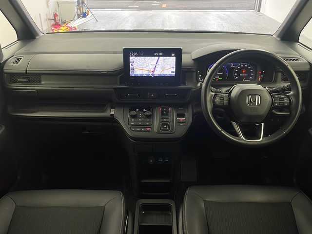 ホンダ ステップワゴン スパーダ eHEV 大阪府 2022(令4)年 5.4万km クリスタルブラックパール 純正９インチナビ/【BT/フルセグTV/USB/AppleCarPlay/AndroidAuto]/純正15.6インチ後席モニター/全方位カメラ/ETC/ドライブレコーダー前後/両側パワースライドドア/ブラインドスポットモニター/衝突被害軽減システム/クルーズコントロール追従/オートライト/コーナーセンサー前後/オットマン/シートバックテーブル/ハーフレザーシート/純正16インチＡＷ/純正フロアマット