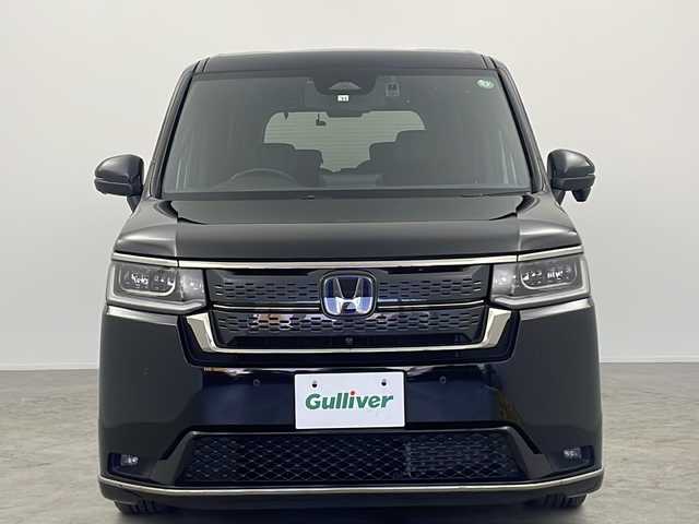 ホンダ ステップワゴン スパーダ eHEV 大阪府 2022(令4)年 5.4万km クリスタルブラックパール 純正９インチナビ/【BT/フルセグTV/USB/AppleCarPlay/AndroidAuto]/純正15.6インチ後席モニター/全方位カメラ/ETC/ドライブレコーダー前後/両側パワースライドドア/ブラインドスポットモニター/衝突被害軽減システム/クルーズコントロール追従/オートライト/コーナーセンサー前後/オットマン/シートバックテーブル/ハーフレザーシート/純正16インチＡＷ/純正フロアマット