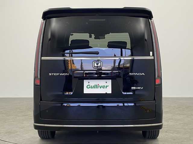 ホンダ ステップワゴン スパーダ eHEV 大阪府 2022(令4)年 5.4万km クリスタルブラックパール 純正９インチナビ/【BT/フルセグTV/USB/AppleCarPlay/AndroidAuto]/純正15.6インチ後席モニター/全方位カメラ/ETC/ドライブレコーダー前後/両側パワースライドドア/ブラインドスポットモニター/衝突被害軽減システム/クルーズコントロール追従/オートライト/コーナーセンサー前後/オットマン/シートバックテーブル/ハーフレザーシート/純正16インチＡＷ/純正フロアマット