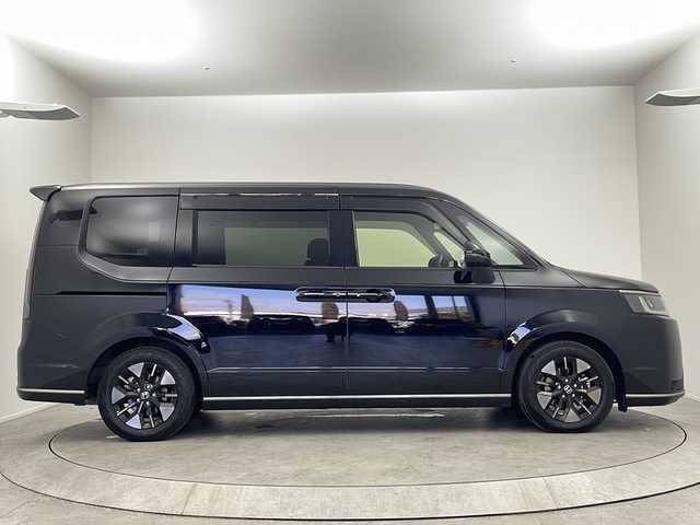 ホンダ ステップワゴン スパーダ eHEV 大阪府 2022(令4)年 5.4万km クリスタルブラックパール 純正９インチナビ/【BT/フルセグTV/USB/AppleCarPlay/AndroidAuto]/純正15.6インチ後席モニター/全方位カメラ/ETC/ドライブレコーダー前後/両側パワースライドドア/ブラインドスポットモニター/衝突被害軽減システム/クルーズコントロール追従/オートライト/コーナーセンサー前後/オットマン/シートバックテーブル/ハーフレザーシート/純正16インチＡＷ/純正フロアマット