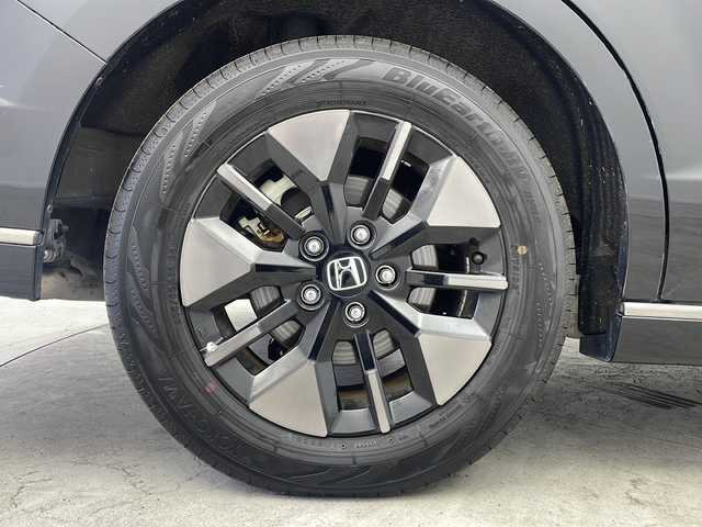 ホンダ ステップワゴン スパーダ eHEV 大阪府 2022(令4)年 5.4万km クリスタルブラックパール 純正９インチナビ/【BT/フルセグTV/USB/AppleCarPlay/AndroidAuto]/純正15.6インチ後席モニター/全方位カメラ/ETC/ドライブレコーダー前後/両側パワースライドドア/ブラインドスポットモニター/衝突被害軽減システム/クルーズコントロール追従/オートライト/コーナーセンサー前後/オットマン/シートバックテーブル/ハーフレザーシート/純正16インチＡＷ/純正フロアマット