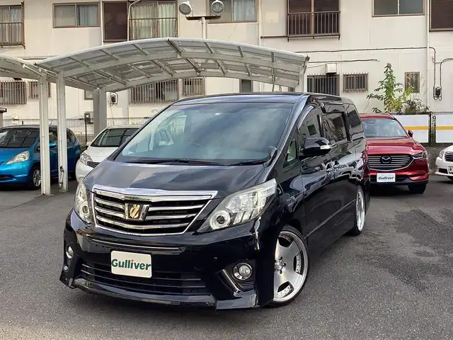 トヨタ アルファード 240S タイプゴールドⅡ 神奈川県 2014(平26)年 10.8万km ブラック 純正9インチSDナビ/ ・フルセグTV/DVD再生/ ・Bluetooth/SD録音/純正11インチフリップダウンモニター/ ・後席用リモコンあり/社外20インチAW/ ・WORKランベックLD1/両側パワースライドドア/パワーバックドア/クリアランスソナー/ハーフレザーシート/クルーズコントロール/キセノン/フォグ/オートライト/バックカメラ/ビルトインETC/ウッドコンビステアリング/ステアリングリモコン/リアオートエアコン/アクセサリーコンセント/ ・AC100V/100W/スマートキーx2/保証書/取扱説明書/点検記録/   27/9・28/11・30/11・R2/11・R3/10