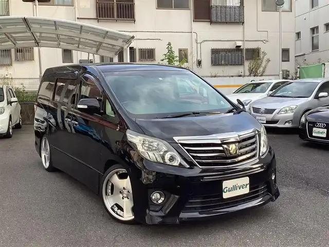 トヨタ アルファード 240S タイプゴールドⅡ 神奈川県 2014(平26)年 10.8万km ブラック 純正9インチSDナビ/ ・フルセグTV/DVD再生/ ・Bluetooth/SD録音/純正11インチフリップダウンモニター/ ・後席用リモコンあり/社外20インチAW/ ・WORKランベックLD1/両側パワースライドドア/パワーバックドア/クリアランスソナー/ハーフレザーシート/クルーズコントロール/キセノン/フォグ/オートライト/バックカメラ/ビルトインETC/ウッドコンビステアリング/ステアリングリモコン/リアオートエアコン/アクセサリーコンセント/ ・AC100V/100W/スマートキーx2/保証書/取扱説明書/点検記録/   27/9・28/11・30/11・R2/11・R3/10