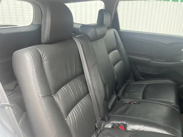 ホンダ オデッセイ アブソルート 三重県 2013(平25)年 14万km ホワイトオーキッドパール ワンオーナー/ACCレーダークルーズ/CMBS衝突軽減ブレーキ/革シート（シートヒーター）/HDDナビゲーション/マルチビューカメラ/リヤエンターテイメント/スマートキー/18インチアルミホイール/HIDヘッドランプ