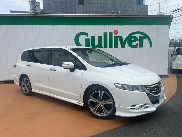 ホンダ オデッセイ アブソルート 三重県 2013(平25)年 14万km ホワイトオーキッドパール ワンオーナー/ACCレーダークルーズ/CMBS衝突軽減ブレーキ/革シート（シートヒーター）/HDDナビゲーション/マルチビューカメラ/リヤエンターテイメント/スマートキー/18インチアルミホイール/HIDヘッドランプ