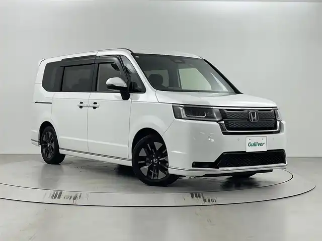 ホンダ ステップワゴン スパーダ 埼玉県 2023(令5)年 3.8万km プラチナホワイトパール ホンダセンシング/純正９インチナビLXM-237VFNi/（フルセグTV/CD/DVD/Bluetooth/USB/AM/FM）/バックカメラ/クリアランスソナー /パドルシフト/アダプティブクルーズコントロール/ブラインドスポットインフォメーション/両側パワースライドドア /パワーテールゲート/前席シートヒーター /２列目オットマン/全席USBチャージャー/ETC/ECON/電動パーキングブレーキ/ブレーキホールド/ロールサンシェード/オートLEDヘッドライト/SPADA専用１６インチアルミホイール
