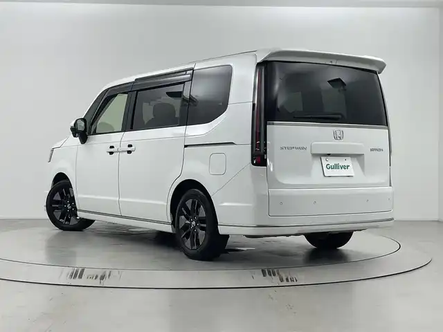ホンダ ステップワゴン スパーダ 埼玉県 2023(令5)年 3.8万km プラチナホワイトパール ホンダセンシング/純正９インチナビLXM-237VFNi/（フルセグTV/CD/DVD/Bluetooth/USB/AM/FM）/バックカメラ/クリアランスソナー /パドルシフト/アダプティブクルーズコントロール/ブラインドスポットインフォメーション/両側パワースライドドア /パワーテールゲート/前席シートヒーター /２列目オットマン/全席USBチャージャー/ETC/ECON/電動パーキングブレーキ/ブレーキホールド/ロールサンシェード/オートLEDヘッドライト/SPADA専用１６インチアルミホイール
