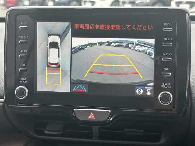 トヨタ ヤリスクロス ハイブリッド Z 岡山県 2021(令3)年 4.8万km ブラックマイカ 純正8インチDA/（AM.FM.TV.BT）/パノラミックビューモニター/レーダークルーズコントロール/横滑り防止装置/レーンキープアシスト/オートマチックハイビーム/前後ドライブレコーダー/ビルトインETC/クリアランスソナー/プリクラッシュセーフティー/シートヒーター/ハーフレザーシート/純正18インチアルミホイール/D席パワーシート