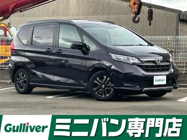 ホンダ フリード ハイブリット クロスター ブラックスタイル 福岡県 2023(令5)年 1.7万km トワイライトミストブラックパール 純正7型SDナビ(フルセグTV/DVD/CD/BT)バックモニタホンダセンシング両側パワースライドドアレーダークルーズコントロールETCシートヒーターUSB純正LEDライト純正フロアマット純正アルミホイールプッシュスタートスマートキー