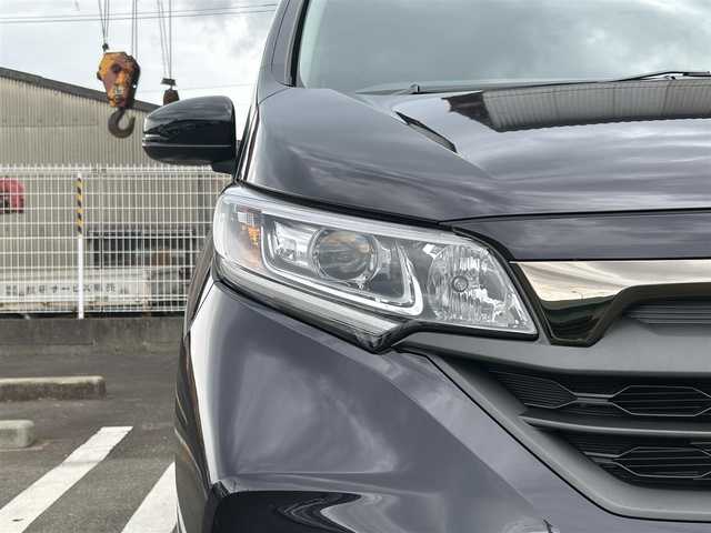 ホンダ フリード ハイブリット クロスター ブラックスタイル 福岡県 2023(令5)年 1.7万km トワイライトミストブラックパール 純正7型SDナビ(フルセグTV/DVD/CD/BT)バックモニタホンダセンシング両側パワースライドドアレーダークルーズコントロールETCシートヒーターUSB純正LEDライト純正フロアマット純正アルミホイールプッシュスタートスマートキー