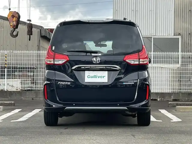 ホンダ フリード ハイブリット クロスター ブラックスタイル 福岡県 2023(令5)年 1.7万km トワイライトミストブラックパール 純正7型SDナビ(フルセグTV/DVD/CD/BT)バックモニタホンダセンシング両側パワースライドドアレーダークルーズコントロールETCシートヒーターUSB純正LEDライト純正フロアマット純正アルミホイールプッシュスタートスマートキー
