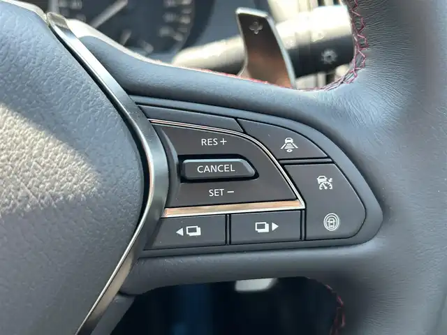 日産 スカイライン ニスモ 愛知県 2023(令5)年 0.1万km グレー ワンオーナー/HDDナビ/フルセグテレビ/バックカメラ（全方位）/クルーズコントロール（追従走行あり）/ドアバイザー/サンルーフ/プッシュスタート/ETC2.0/パドルシフト/クリアランスソナー/コーナリングランプ/純正フロアマット/フォグランプ/カラーコードKCE/AM/FM/USB/BT/TV/NISMO専用バンパー〈フロント・リヤ〉/ NISMO専用LEDフォグランプ〈フロント・リヤ〉/ NISMO専用サイドシルプロテクター/ NISMO専用エンブレム〈フロント・リヤ〉/ NISMO専用GTエンブレム〈サイド〉/NISMO専用タイヤ（DUNLOP SP SPORT MAXX GT 600）/NISMO専用エンケイ製19インチアルミホイール/シートヒーターD+N席
