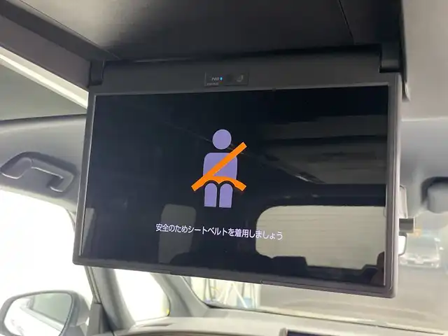 トヨタ アルファードハイブリット Z 愛知県 2024(令6)年 4.1万km プラチナホワイトパールマイカ 禁煙車/純正14インチナビ/（AM/FM/フルセグTV/Bluetooth/USB）/全方位カメラ/フリップダウンモニター/ワイヤレス充電/AC100V電源/デジタルインナーミラー/トヨタセーフティセンス/・プリクラッシュセーフティ/・レーダークルーズコントロール/・レーンディパーチャーアラート/・オートマチックハイビーム/ヘッドアップディスプレイ/ブラインドスポットモニター/ETC２．０/前後ドライブレコーダー/オットマン/パワーシート/シートベンチレーション/シートヒーター/両側パワースライドドア/パワーバックドア/電子パーキングブレーキ/オートホールド/純正アルミホイール/純正フロアマット/3眼式LEDヘッドライト/フロントフォグランプ/プッシュスタート/スマートキー/スペアキー有/横滑り防止装置/革巻きステアリング