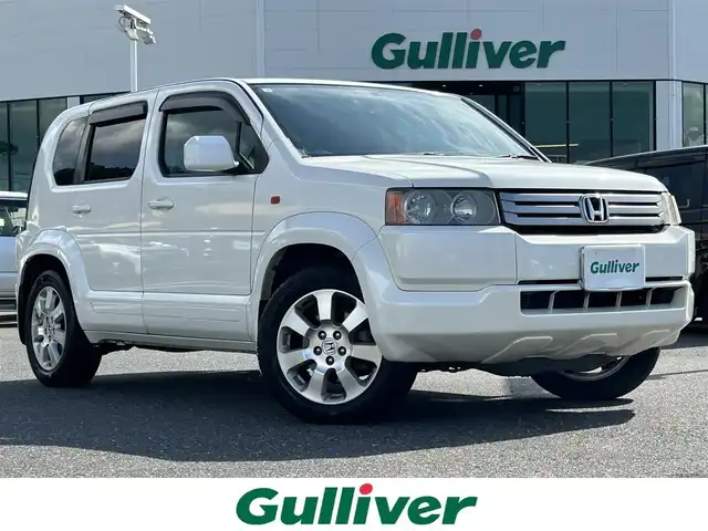 ホンダ クロスロード 20X 島根県 2007(平19)年 11.6万km プレミアムホワイトパール 登録時走行距離115433km/純正ナビ（CD・DVD・AM・FM）/バックカメラ/ETC/3列シート/純正フロアマット/純正AW17インチ/盗難防止装置/オートライト/運転席・助手席エアバック/スマートキー/ドアバイザー/ステアリングスイッチ