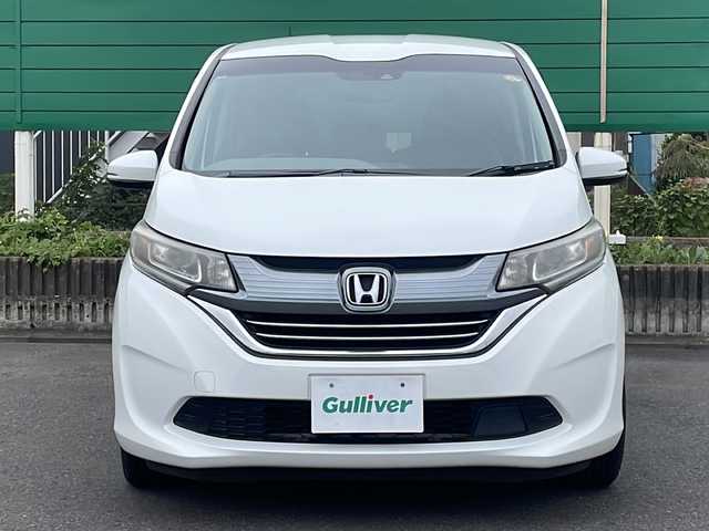 ホンダ フリード ハイブリット G ホンダセンシング 茨城県 2017(平29)年 7.1万km ホワイトオーキッドパール ワンオーナー/純正SDナビ/バックカメラ/Bluetooth接続/ビルトインETC/横滑り防止装置/レーンキープアシスト/衝突軽減システム/オートライト/LEDヘッドライト/両側パワースライドドア/ハーフレザー/純正フロアマット/純正15インチアルミホイール/ウォークスルー/保証書/取扱説明書/記録簿